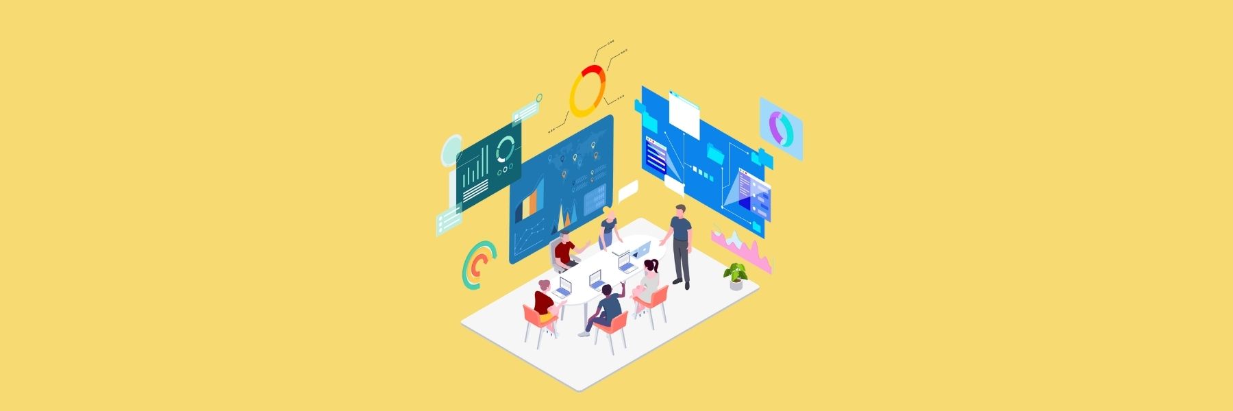 Team collaborating around a table with digital dashboards